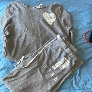 Women’s sweatsuit, size medium too and small pants.